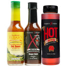 Elijah's Xtreme Sweet & Heat Trio Hot Sauce Bundle by Elijah's Xtreme features Pineapple-Mango Habanero, Father and Son Handcrafted Reaper, and Hot Honey infused with Carolina Reaper against a white background.