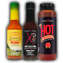 The Elijah's Xtreme Sweet & Heat Trio Hot Sauce Bundle includes Pineapple-Mango Habanero, Father and Son Handcrafted Reaper Sauce, and Hot Honey infused with fiery Carolina Reaper for a perfect sweet heat.