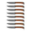Eight Folded Steel Lotus 8-Piece Steak Set knives with AUS10 stainless steel blades and wooden handles are arranged horizontally against a white background.