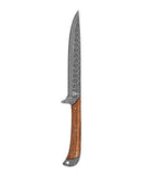 The Folded Steel Lotus Carver with AUS10 stainless steel features a decorative patterned blade and curved wooden handle with metal accents, showcased on a white background. This premium knife is crafted by Folded Steel.