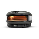 A charcoal-colored Gozney Arc XL outdoor pizza oven with a glowing fire in the hearth and a digital temperature display showing 950 degrees on the base.