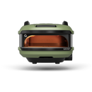 The Gozney Tread Portable Pizza Oven is a green, adventure-ready oven with a black base, front opening, and orange interior. The Gozney logo appears on the lower front. Shown on a white background, it’s perfect for outdoor kitchens.