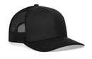 The Haka Hat Blank Trucker Hat | Snapback by Haka Hat, featuring a solid black front panel, curved brim, comfort-fit sweatband, and black mesh back panels, is displayed on a white background.
