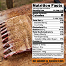 A rack of raw ribs on a wooden board, seasoned with Hardcore Carnivore Camo Game & Lamb Seasoning. An overlaid nutrition label shows 0g protein per serving. Text below reads: “Not suitable for carnivore diet.” Brand: Hardcore Carnivore.