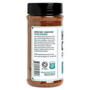 A clear plastic jar of Hardcore Carnivore Tex-Mex Taco and Fajita Seasoning with a black lid. The label spotlights its versatility for Tex-Mex dishes, tacos, and fajitas, plus branding and usage instructions.