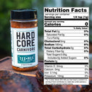 A jar of Hardcore Carnivore Tex-Mex Taco and Fajita Seasoning rests outside beside a nutrition label—zero calories, fat, carbs, and protein per 1/4 tsp—ideal for spicing up tacos or fajitas without the guilt.