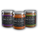 Three glass jars of Harmacy Hot Sauce Co. Extra Hot Variety Pack