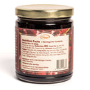 The In the Curious Kitchen Bourbon-Infused Gourmet Gift Set by In The Curious Kitchen features cherry preserves in a glass jar with a gold lid; each serving has 90 calories and contains dried Michigan cherries and Kentucky bourbon.