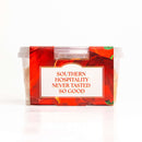 A clear plastic container with a red "Southern hospitality never tasted so good" label displays In The Curious Kitchen Pimento Cheese 2 Pack by In The Curious Kitchen, set against a plain white background.