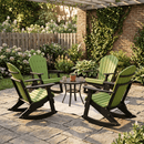 Four Kanyon Living Adirondack Rocking Chairs in Lime Green & Black surround a round table with coffee cups and a pitcher on a sunny patio, set in a lush garden—perfect for all-weather comfort and style.