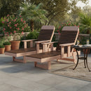Two Kanyon Living Poly Lumber Chaise Lounges with Arms in Deluxe Brazilian Walnut and Weathered Wood sit side by side on a patio. A small table with drinks completes this eco-friendly Kanyon Living set, ideal for outdoor relaxation among potted plants and palm trees.