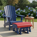 A blue Adirondack chair with a matching red footrest sits on a wooden deck next to a small round table holding a drink and a magazine. Lush hydrangeas and greenery are visible in the background.