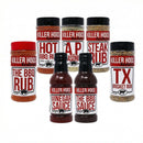 The Killer Hogs BBQ Rub and Sauce Complete Gift Set features seven products with bold red, black, and white branding—ideal for any barbecue lover. All items are arranged upright against a white background.