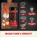 A bottle of Kosmos Q Dirty Bird Hot Chicken Rub sits on a wooden board with spices, peppers, garlic, and onions, highlighting this award-winning spicy seasoning's versatility for poultry, beef, pork, and seafood.