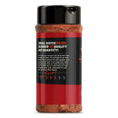A bottle of Kosmos Q Dirty Bird Hot Chicken Rub displays coarse, reddish-brown BBQ seasoning inside. The red and black label features product details, making it the perfect spicy rub for adding fiery flavor to chicken.