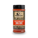 A 9.5 oz (270g) plastic bottle of Mossy Oak Seasoning - Bottomland BBQ Rub by Bourbon Barrel Foods, featuring a camouflage label with red accents. This gluten-free blend is smoky, sweet, savory—perfect for outdoor grilling.