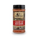 A 9.6 oz (272g) plastic container of Bourbon Barrel Foods’ Mossy Oak Seasoning - Country Cajun, featuring a black lid and camouflage label with a red accent highlighting its spicy blend—ideal for outdoor cooking.