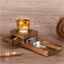 The DDR BBQ Supply Multifunction Cigar & Whiskey Gift Set Stand features a whiskey glass, two cigars, cutter, built-in ashtray, and drawer—an ideal lounge accessory for any cigar enthusiast.