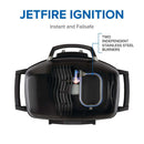 Top view of the Napoleon TravelQ PRO285 Portable Gas Grill by Napoleon Grills, featuring Jetfire Ignition, a visible blue flame, and two independent stainless steel burners. Text reads: “Instant and Failsafe.”.