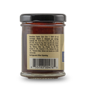 A small glass jar with a black lid displays the nutrition facts and barcode on the back. It contains Pendennis Club The Original Henry Bain’s Sauce by Bourbon Barrel Foods, the classic Kentucky steak sauce.