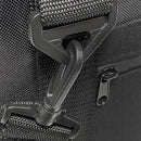 Close-up of a black plastic swivel hook attached to a fabric loop on the Polar Bear Coolers 12 Pack Original Nylon Soft Cooler, with a zipper pocket in the background.