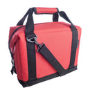 The Polar Bear 12 Pack Original Nylon Soft Cooler by Polar Bear Coolers is a red fabric bag with black handles, a detachable black shoulder strap, and black bottom trim, shown on a white background.