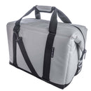 The Polar Bear 24 Pack Original Nylon Soft Side Cooler by Polar Bear Coolers is a light gray rectangular duffel with black handles, removable shoulder strap, and zippered top, ideal as a 24 pack cooler and shown against a white background.