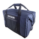 The Polar Bear 24 Pack Original Nylon Soft Side Cooler by Polar Bear Coolers is a navy blue and black insulated bag with handles, zipper top, superior ice retention, and a front pocket featuring the Polar Bear logo patch.