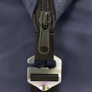A close-up of the black zipper on the Polar Bear 24 Pack Original Nylon Soft Side Cooler by Polar Bear Coolers, with a metallic multi-tool on a black strap—designed for superior ice retention.