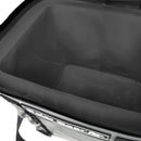 A close-up of the empty Polar Bear Topper 30 Floating Soft Cooler by Polar Bear Coolers highlights its gray interior, black zipper, and a portion of the carrying strap on the outside.