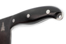Close-up of the Primrose Serbian Chef Knife by Folded Steel, featuring a black handle with three metal rivets and a curved end, isolated on white—crafted with a 1095 high-carbon steel blade, perfect for outdoor cooking.