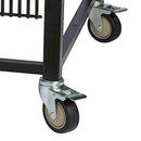 Close-up of the Smokin Brothers "24" Premier Plus Pellet Grill cart’s corner, featuring a black leg with a metal bracket and a swiveling caster wheel. The black wheel has a beige center, shown against a white background.