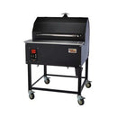 The Smokin Brothers “30” Premier Plus Pellet Grill is a black, American-made outdoor grill smoker with metal construction, a control panel, wheels, closed lid, and chimney on top.