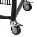 Close-up of two black swivel caster wheels with beige centers, attached to a black metal cart leg—one features a brake. Ideal for moving your Smokin Brothers “36” Premier Plus Pellet Grill.