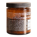 Spice Witch Black Garlic Chili Crisp by Spice Witch comes in a brown glass jar with a black lid and features ingredients like avocado oil and black garlic. Add this umami condiment to pizza, pasta, eggs, soup, and more for bold flavor.