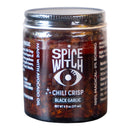 Spice Witch Black Garlic Chili Crisp is an umami condiment in a 6 fl oz glass jar with a black label, eye logo, and white text, made with avocado oil.