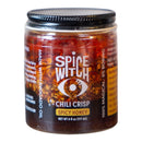 A glass jar labeled Spice Witch Chili Crisp Spicy Honey Flavor, with visible chili flakes in oil. The label features the Spice Witch brand, highlights magical flavor, and shows a 6 oz (177 mL) net weight—a crunchy treat for spicy honey fans.