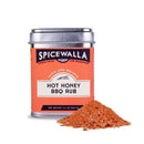 Spicewalla Hot Honey BBQ Rub can with spilled rub on a white background