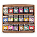 The Spicewalla Kitchen Essentials 18-Pack Collection features three rows of vibrant spice tins in a cardboard box—perfect for any kitchen and packed with favorites like cumin, smoked paprika, basil, cinnamon, and more.