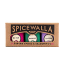 Spicewalla spice set packaging with three jars labeled Zatar, Berbere, and Harissa on a white background.