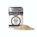 A tin of Spicewalla White Sesame Seeds is displayed beside a small pile of seeds, highlighting this versatile ingredient from the Spicewalla brand on a plain white background.