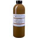 A quart bottle of Terrapin Ridge Farms Apple Cider Maple Balsamic Vinaigrette, featuring a tan-brown liquid and a white label with product details and ingredients.