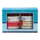 The Terrapin Ridge Farms Everyday 2 Pack Hot Pepper Bacon Jam Gift Set features two cheese topper condiments—hot pepper bacon jam and red pepper jelly—beautifully displayed against a blue patterned background.