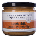 Terrapin Ridge Farms Hatch Chile Bacon Ranch Dip comes in an 11 oz (311 g) glass jar with a white label, black and orange text, and a black lid—a smoky Southwest dip by Terrapin Ridge Farms.