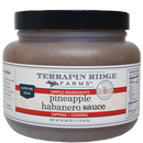 A quart jar of Terrapin Ridge Farms Pineapple Habanero Sauce with a black lid. This sweet and spicy sauce is gluten free, vegan, ideal for dipping or cooking. Net wt: 39.28 oz (1113.56g).