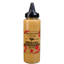 A Terrapin Ridge Farms Sriracha Horseradish Garnishing Squeeze Sauce bottle with a black cap and yellow-orange label sits on a plain white background, ideal as a squeeze-on garnish.