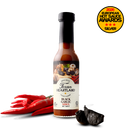 A bottle of Texan Heartland Black Garlic Arbol Hot Sauce sits beside chile de árbol peppers and black garlic, with a “2026 European Hot Sauce Awards Silver” badge in the top right, highlighting this umami-rich Texan Heartland sauce.