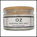 Texas Salt Co. Oz Australian Salt comes in a clear glass jar with wooden lid. The label shows "OZ AUSTRALIAN SALT Net Wt 2oz (57g)" and the Texas Salt Co brand—ideal for those wanting premium sea salt for cooking.
