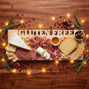 The Words With Boards Gluten Free Serving Board 19" x 8" by Words with Boards, LLC features "GLUTEN FREE" cut out to ensure clear food separation—ideal for entertaining with cheeses, meats, and more.