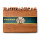 The Words with Boards Large Personalized Cutting Board (12.5" x 16") by Words with Boards, LLC features custom engraving, a green branded label, and a "Handmade in Baltimore, Maryland" heart—an ideal personalized gift.